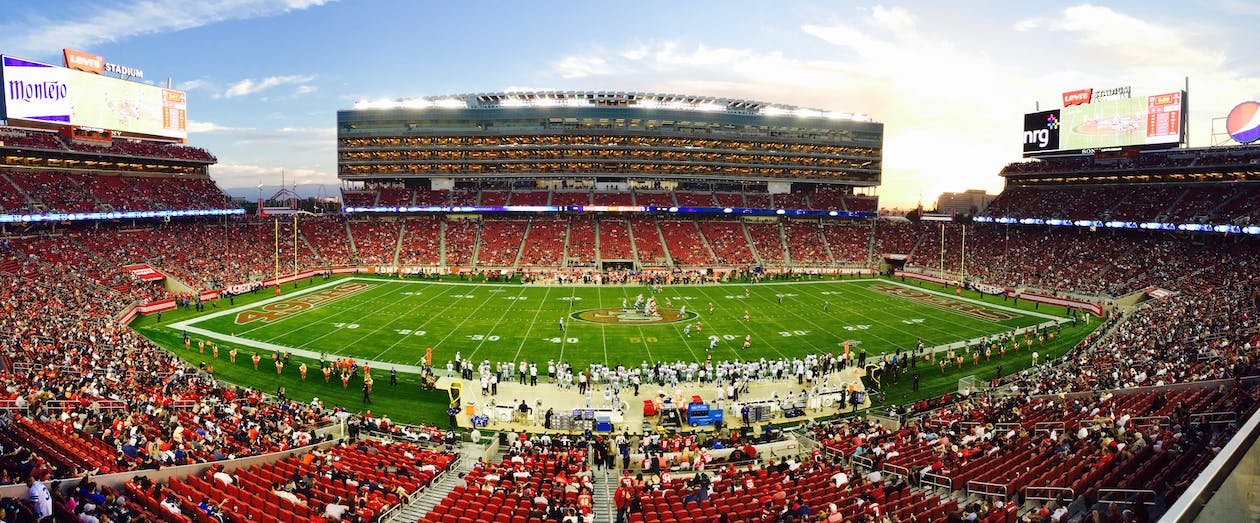 Free Nfl Stadium Field Full With Crowd Watching the Game during Daytime Stock Photo